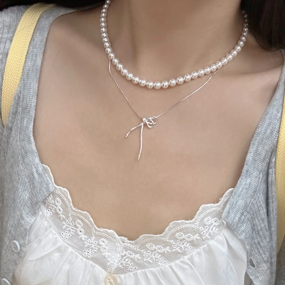 链子925银合成锆石 S925纯银线条蝴蝶结打结项链简约冷淡风项链