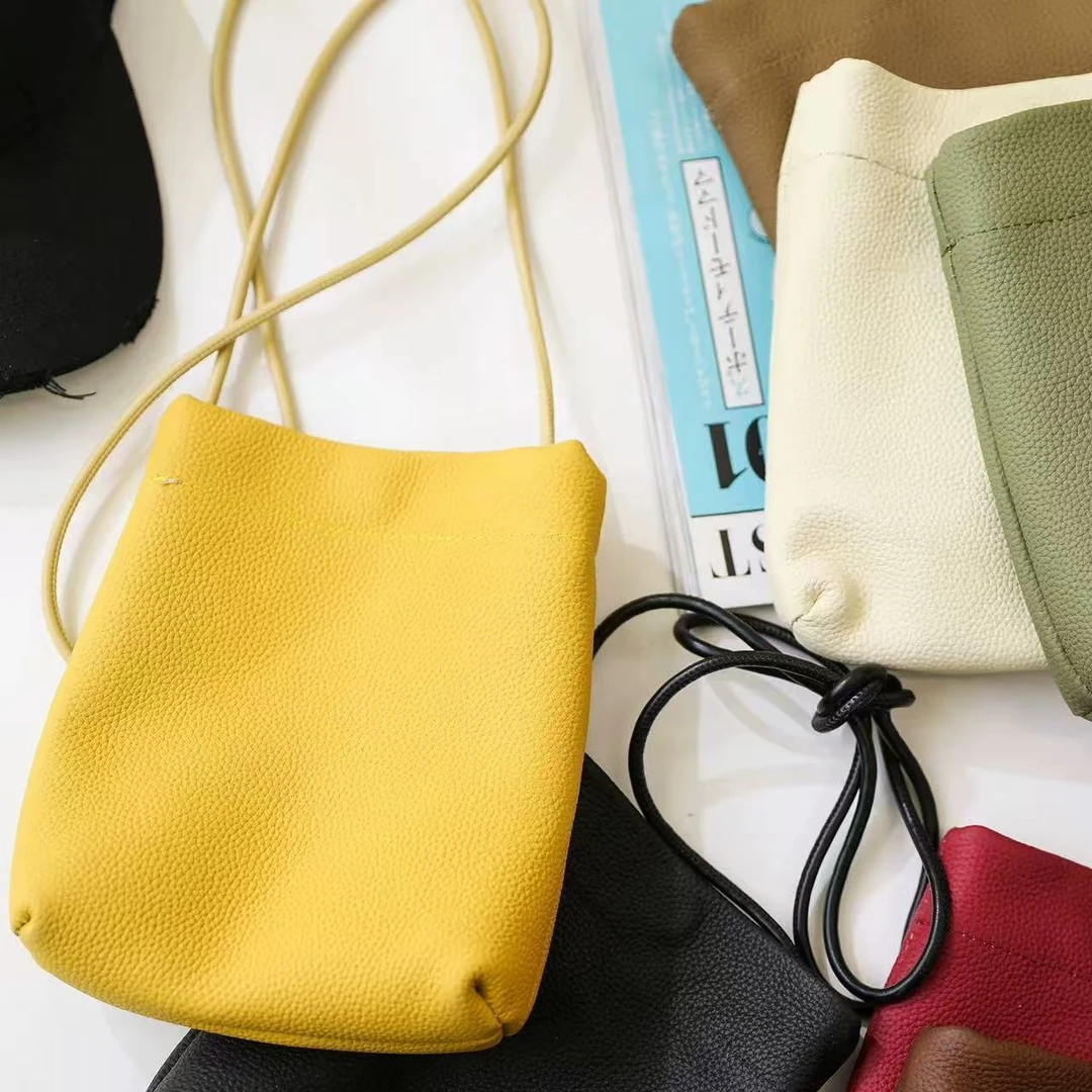 茹雅春季新款糖果色手机包1033