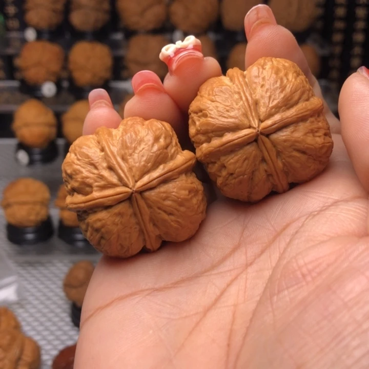 橄榄核把件85状元红四楞