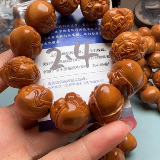 橄榄核手串橄榄雕的