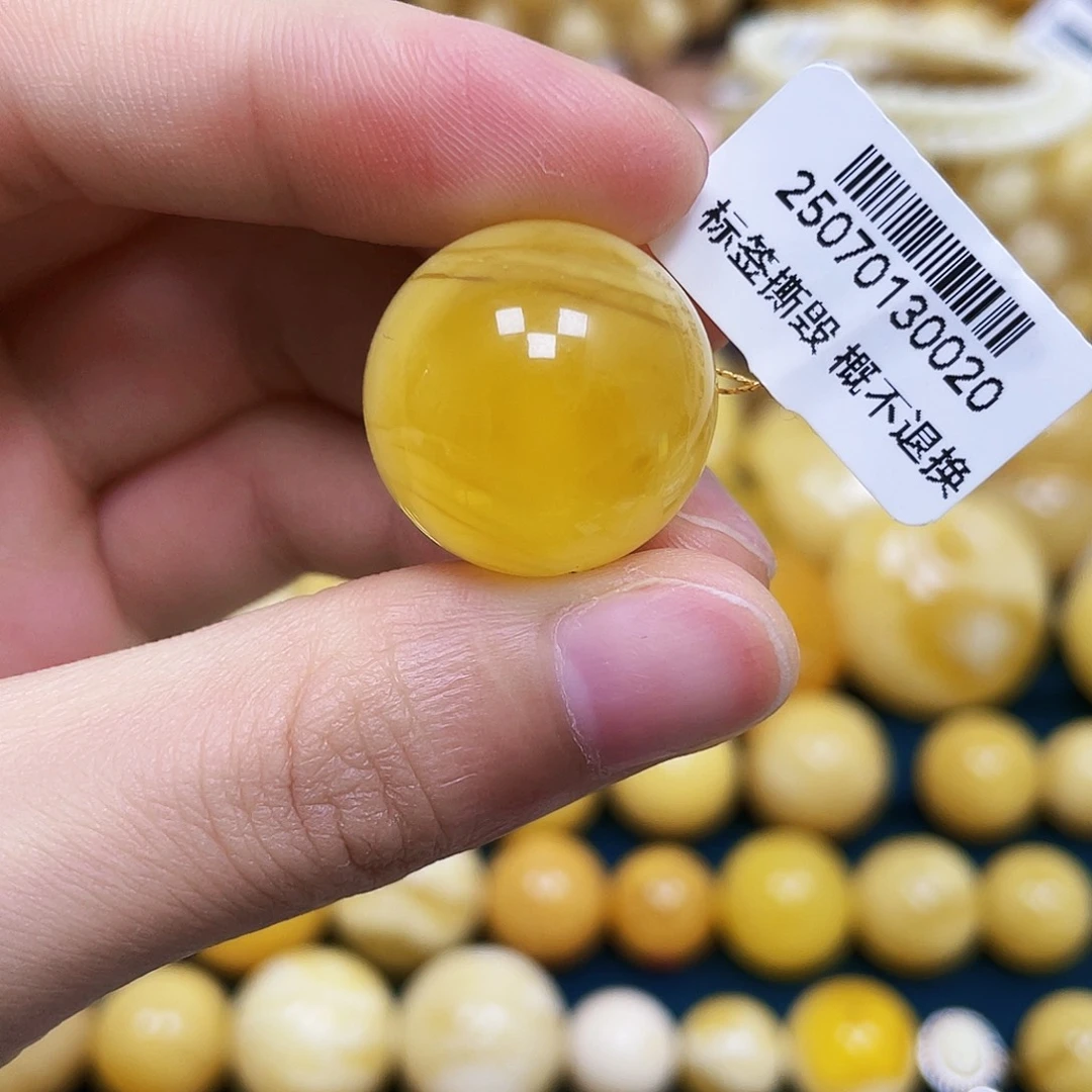琥珀未镶嵌裸石20.8mm.瑕