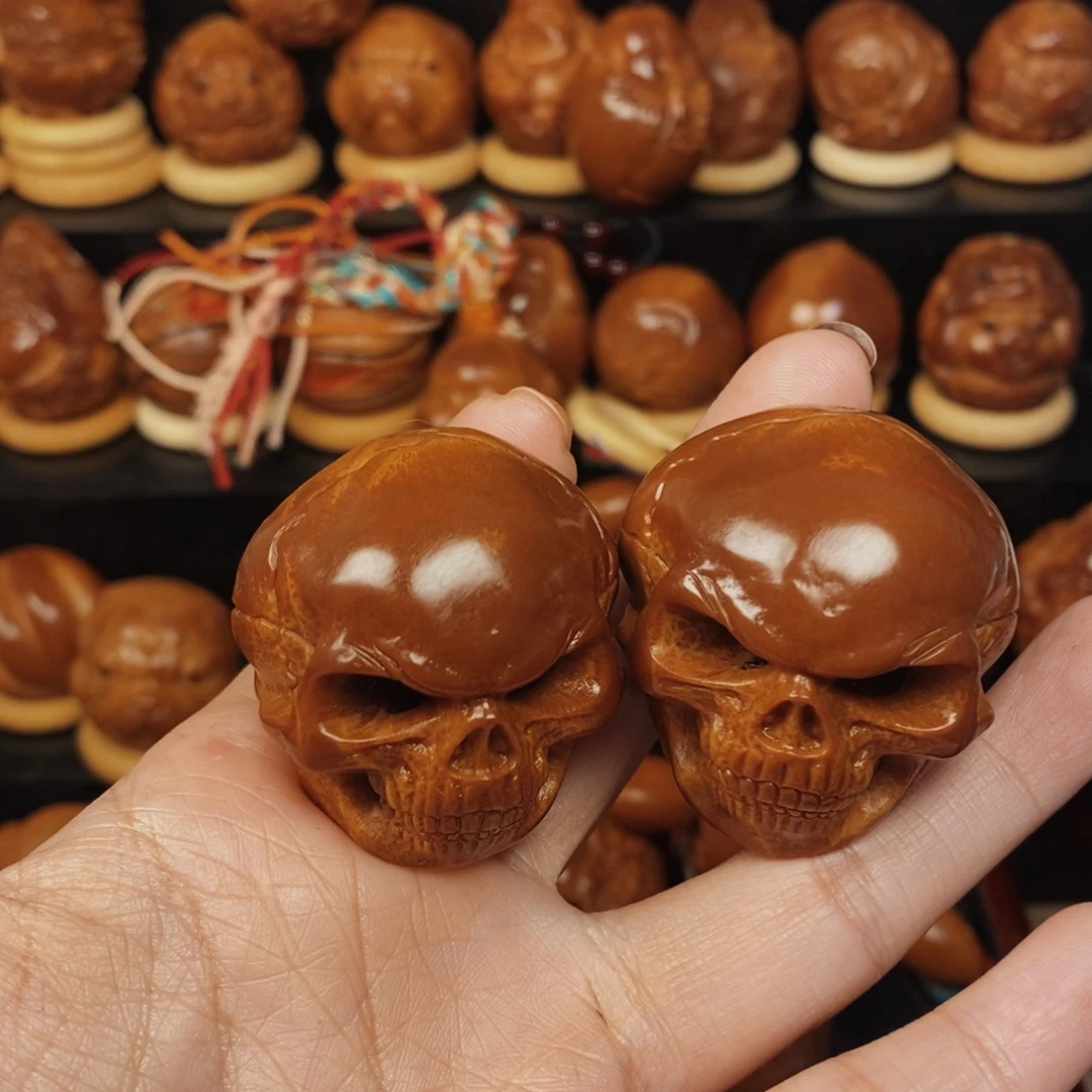 磊***子手串/手链橄榄核骷髅一对00118