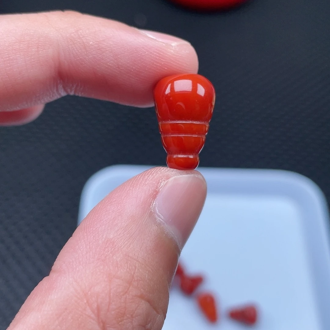 南红玛瑙11*17柿子红三通一颗未镶嵌