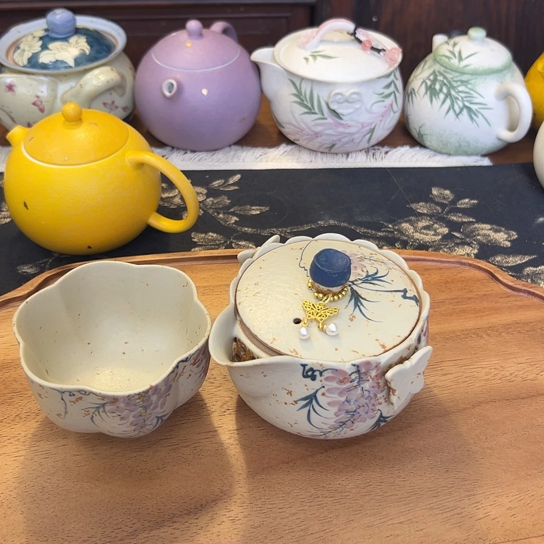 茶具等产品的生产和销售为一体的
