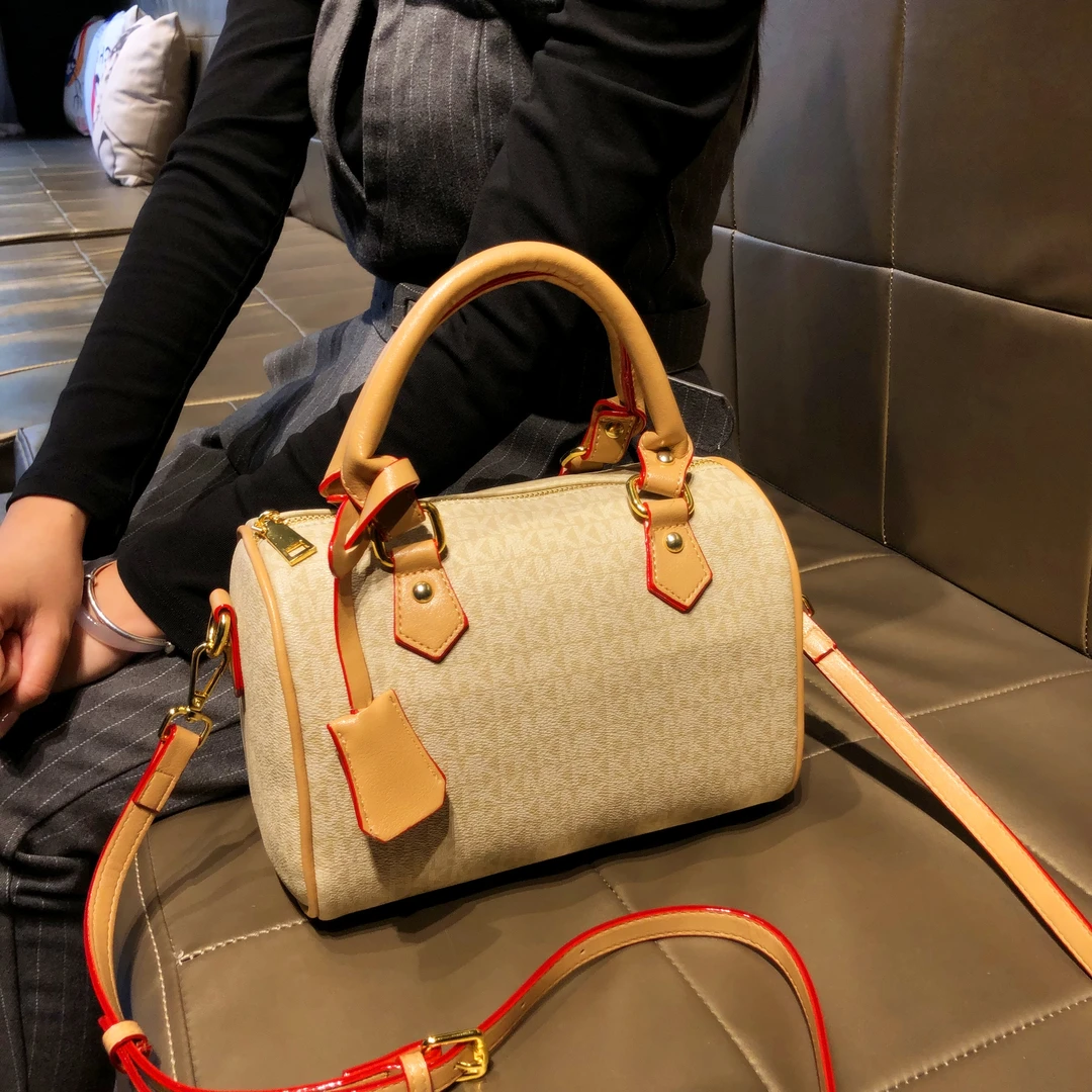 MIVM时尚品牌包包女式2025新款时尚高级感手提枕头包单肩斜挎波士