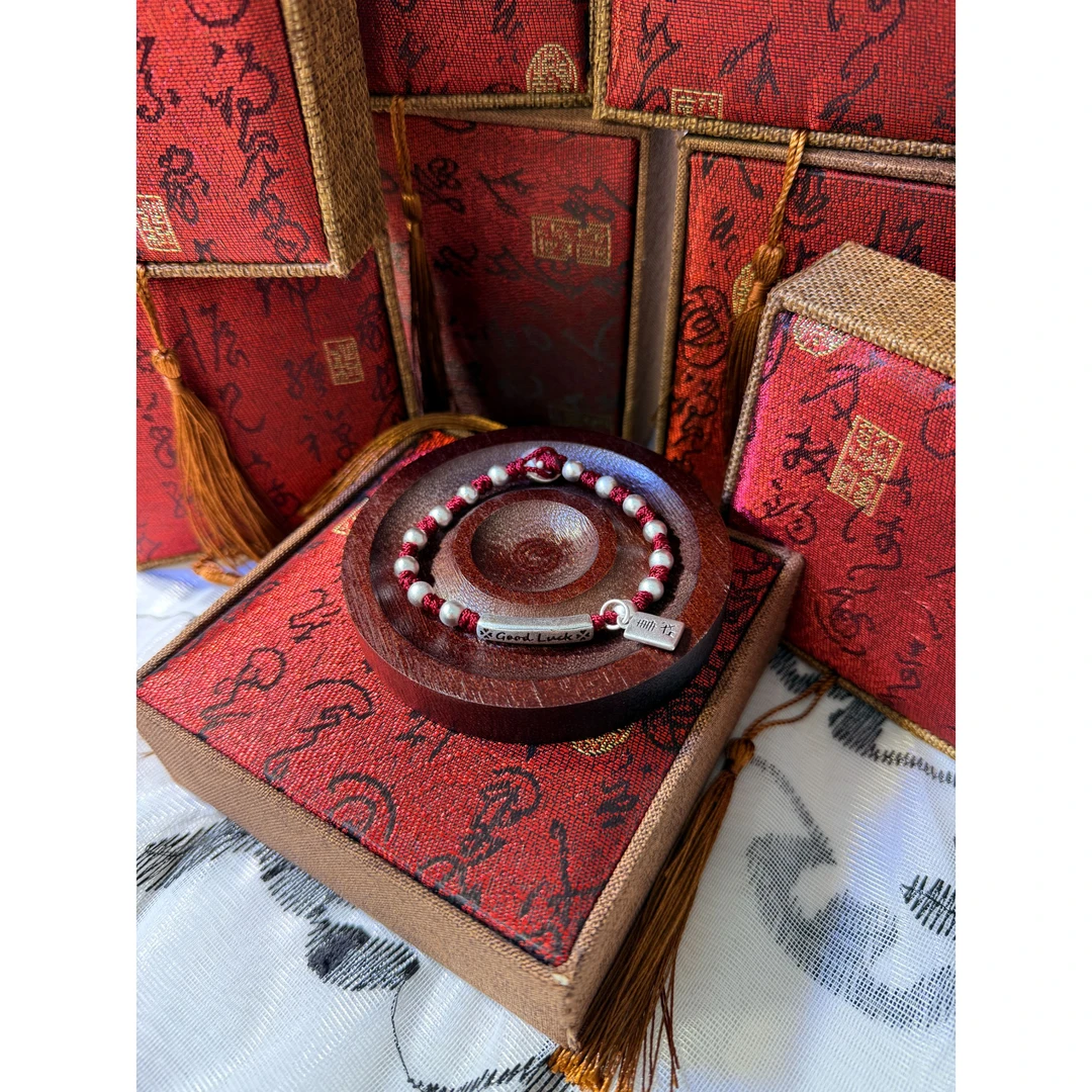 足银银制品 S193 红绳笑脸lucky手绳直播间选款时尚百搭精美手镯