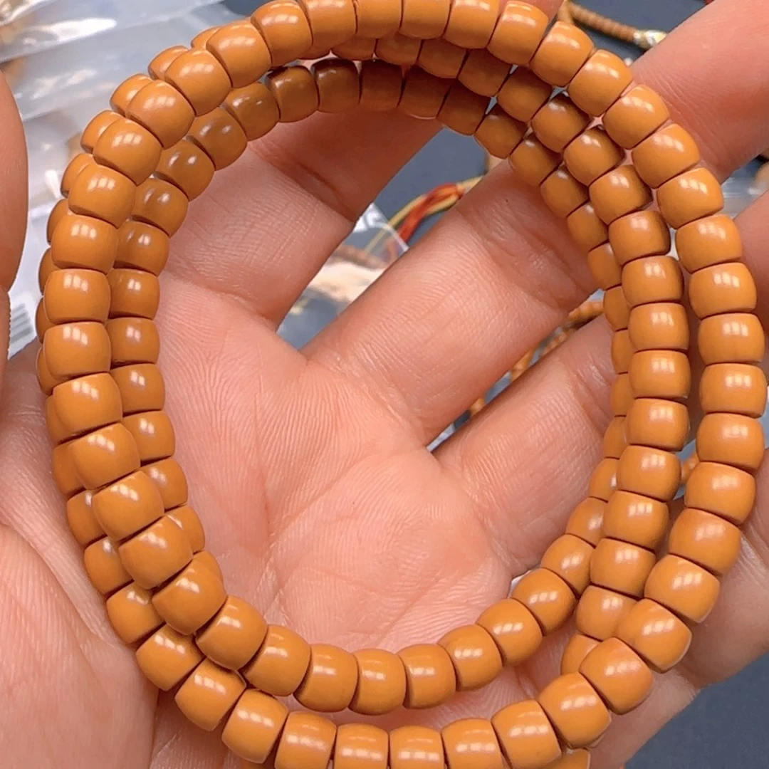 橄榄核手串核尖直切尺寸6.4加长版老挝带三花全品