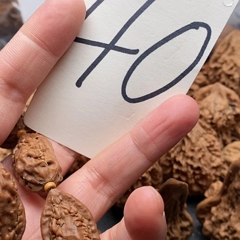 桃核吊坠麒麟角手串