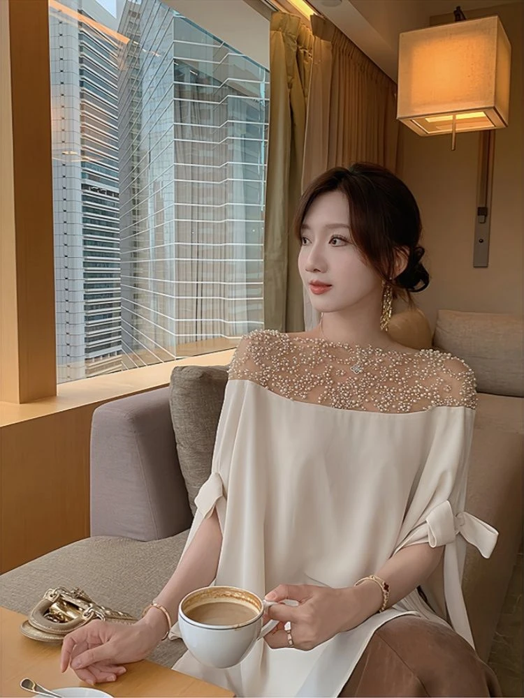 小众时尚珍珠上衣贵气感斗篷宽松显瘦气质高级感咖色半身裙两件套