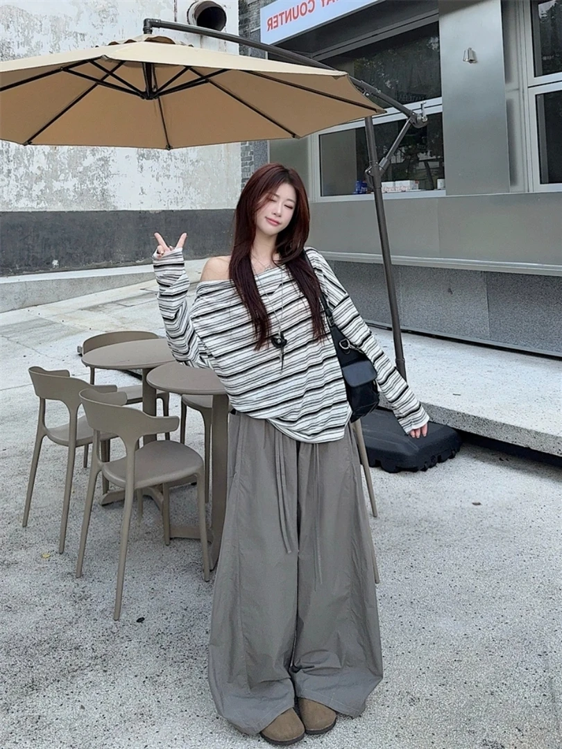 韩系时尚风格女生秋季条纹长袖上衣与阔腿长裤套装