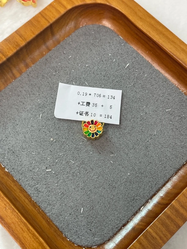 F104019足金999小太阳花通孔【主图有克重】