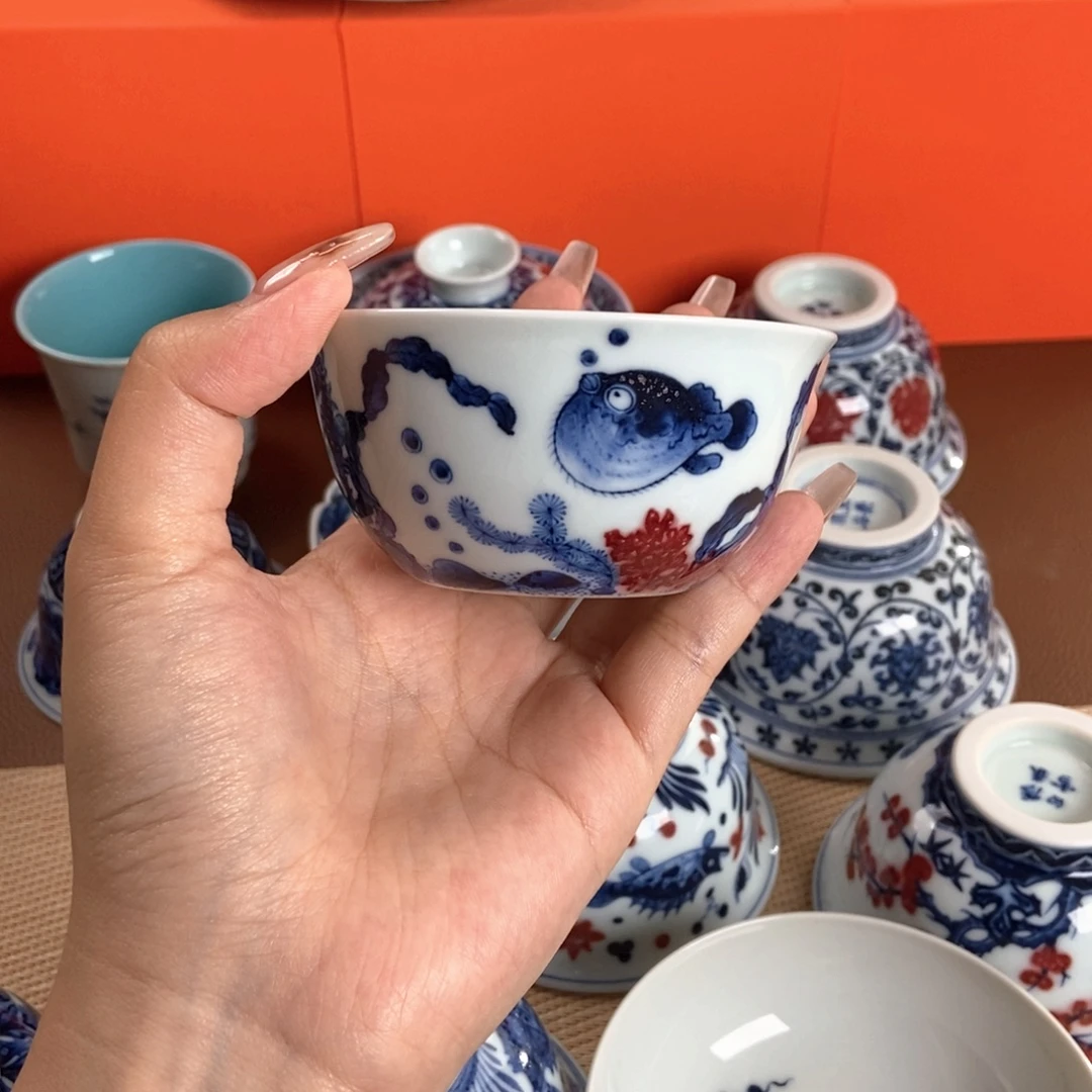 阳春白雪釉里红海错图缸杯