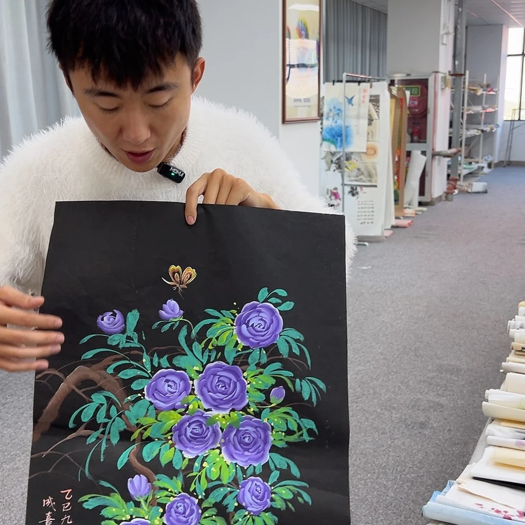 国画卖字画的小男孩