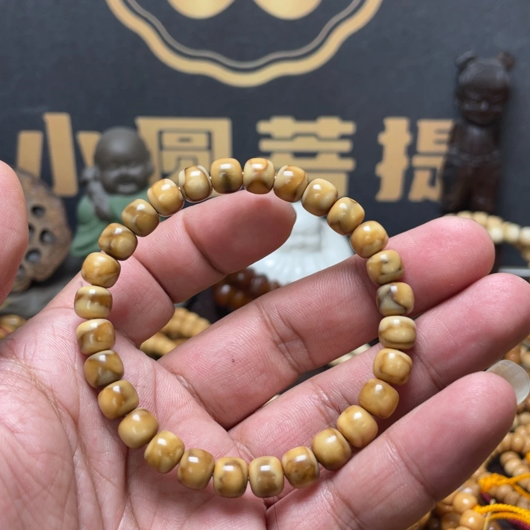 梦***姿龙眼菩提吊坠龙脊菩提8*7老型手串妖花老料无科技