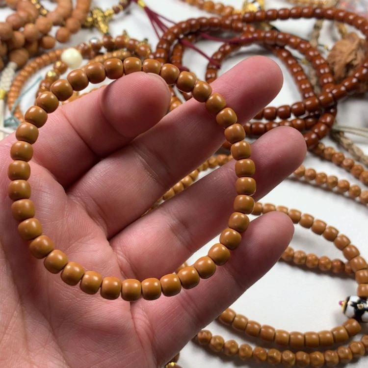 【闪购商品】橄榄核吊坠悠*。。。。。。。。。。。