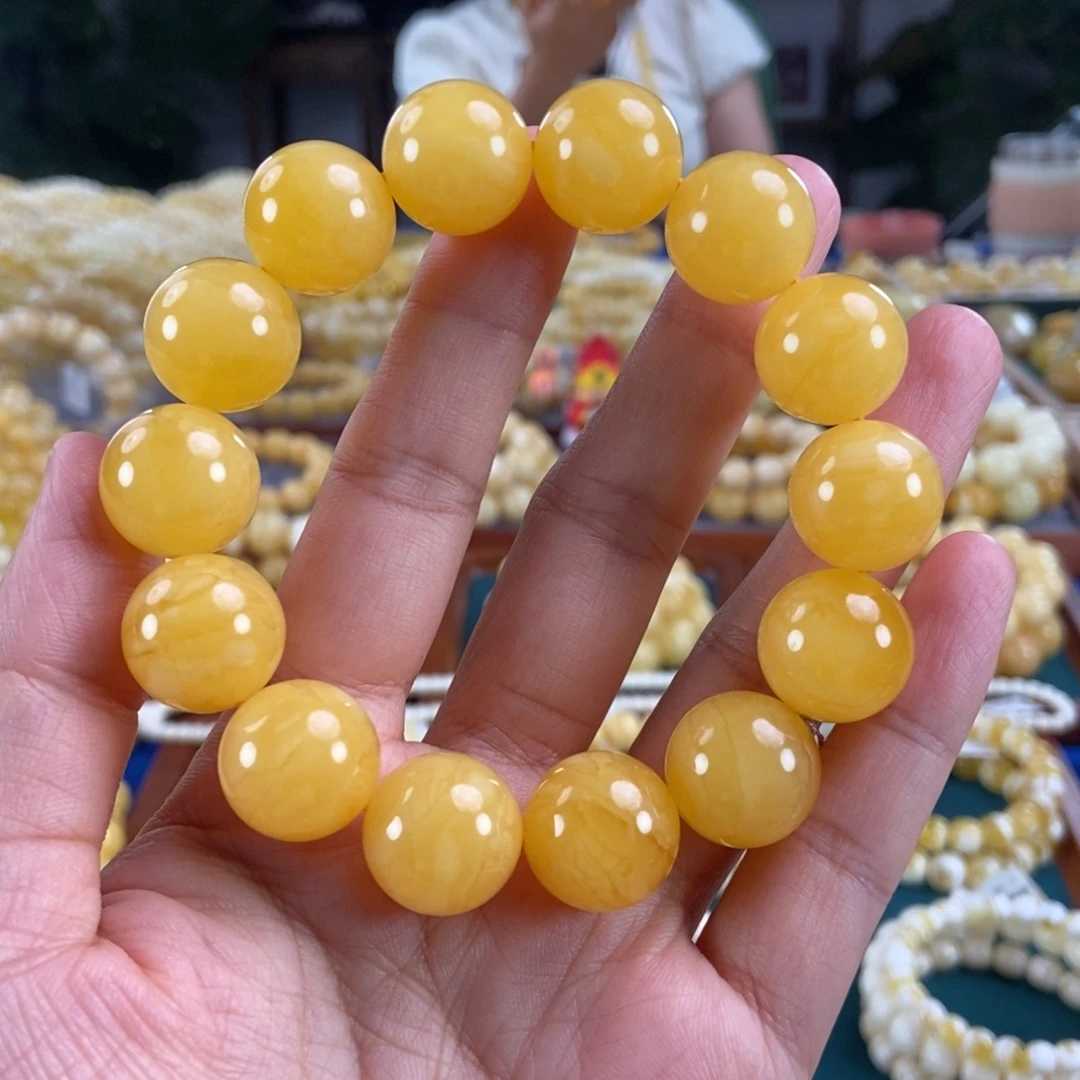 琥珀未镶嵌珠宝奇石16同料黄白花蜡圆珠34.68