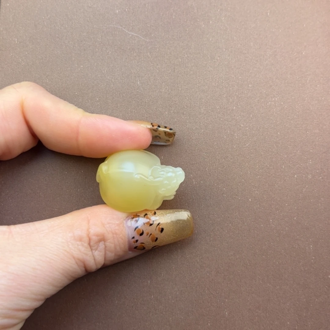 姜***叔石英质玉未镶嵌黄蜡石吊坠