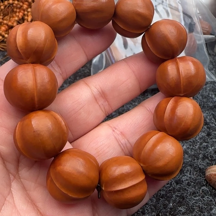 橄榄核手串臭*子橄榄核工艺手串