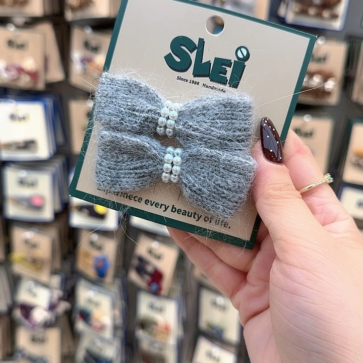 灰色蝴蝶结珍珠鸭夹