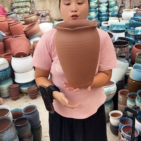 口20高31瑕疵一个盆子。
