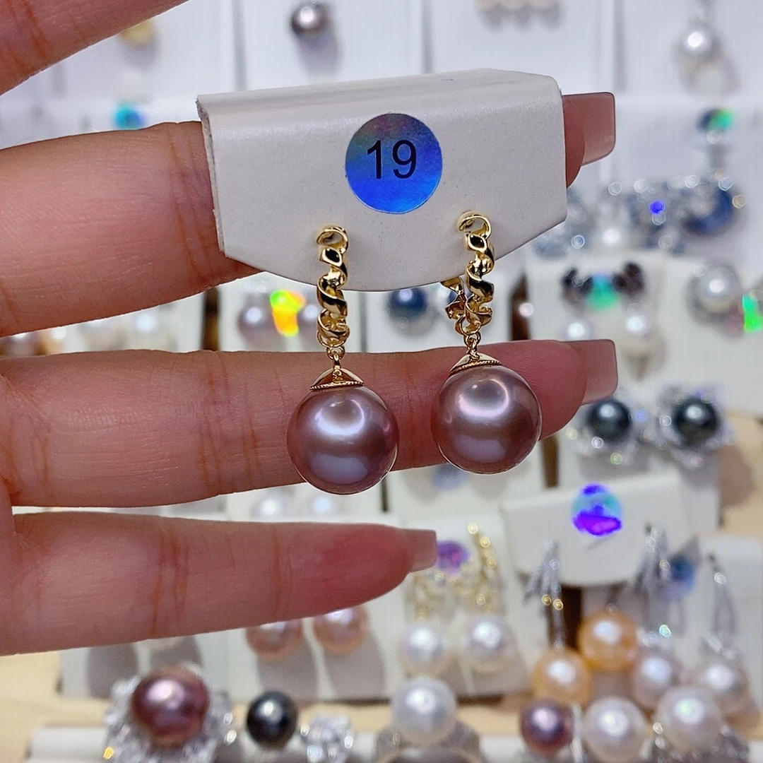 玉***城淡水珍珠银S925镶嵌耳饰