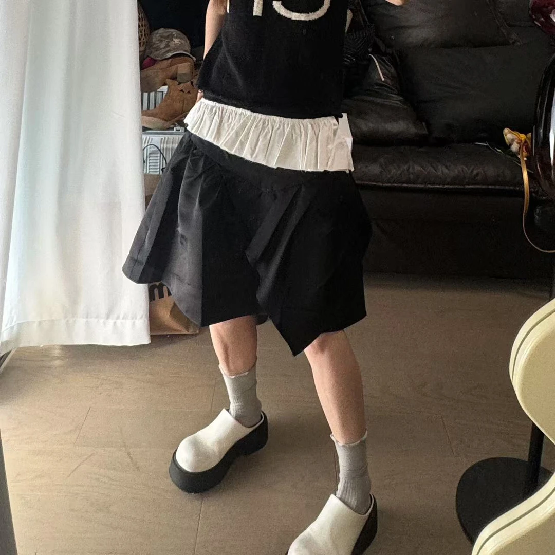 不规则拼接辣妹风半身裙