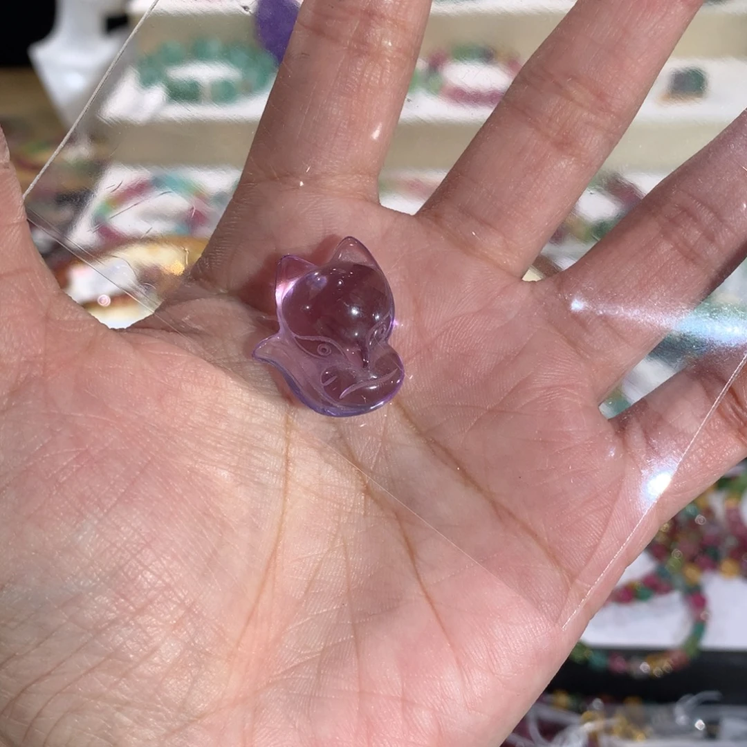 姚****未镶嵌紫晶颈饰雕刻件