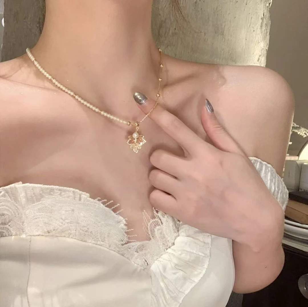 合金仿珍珠项链 秋冬轻奢可抽拉闪锆枫叶珍珠项链女气质毛衣链