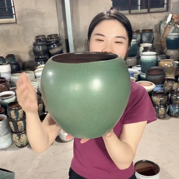 紫砂花盆正品口19高23。z z z z z