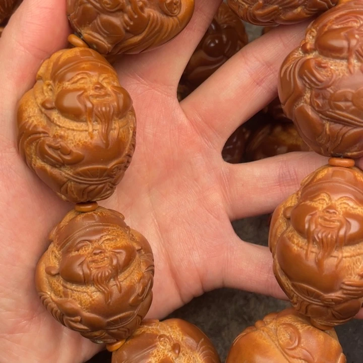 吴***波橄榄核吊坠橄榄核