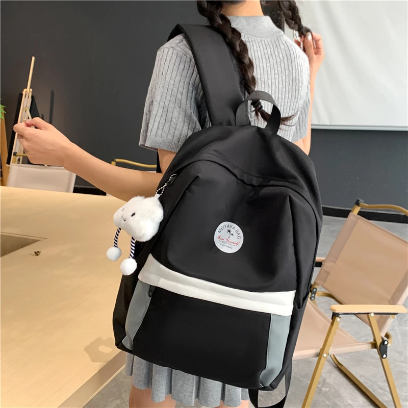 新店福利韩版开学季学生书包女时尚小众大容量双肩背包纯色简约