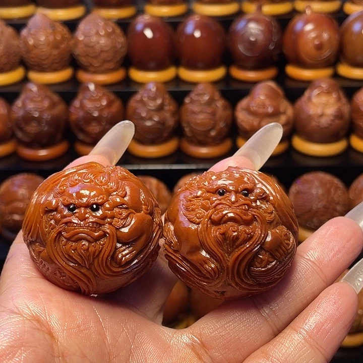 殇***宠橄榄核把件橄榄雕刻