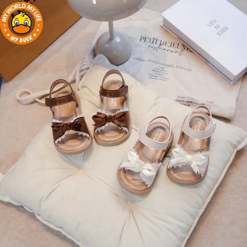 小黄鸭女童凉鞋2025夏季新款韩版小女孩蝴蝶结蕾丝宝宝软底沙滩鞋
