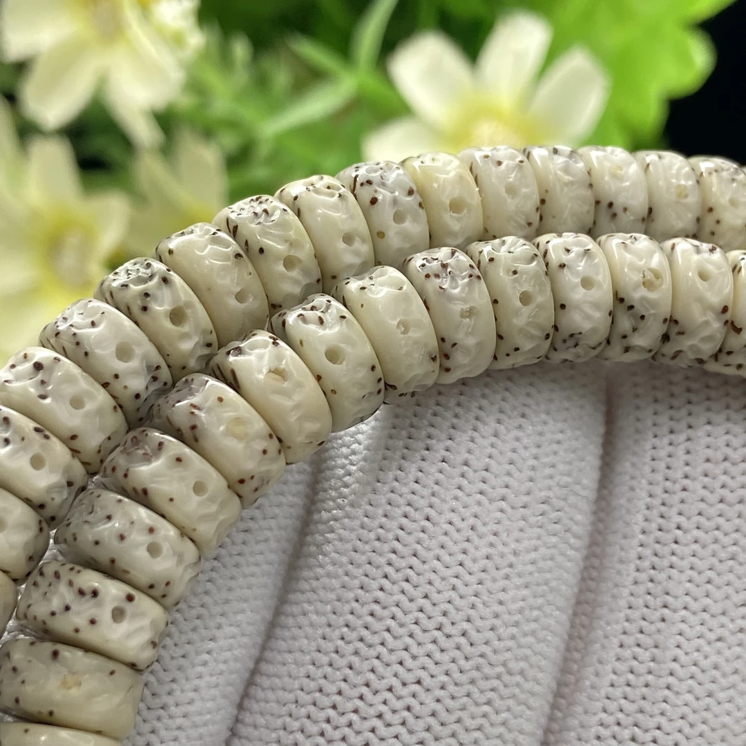 XGG9406海南正宗原生态石玉料大留白星嘎药片珠文玩长串