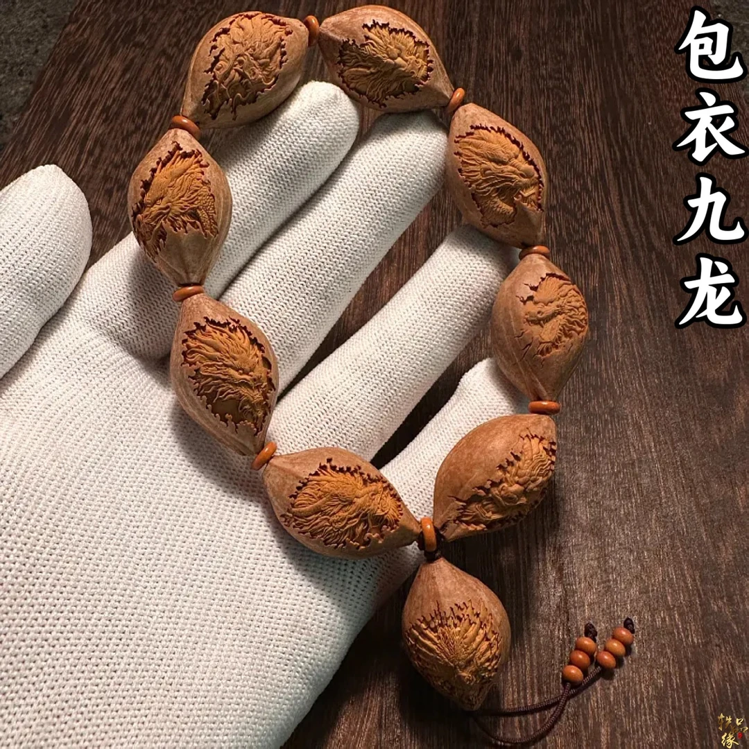 浮雕包衣九龙橄榄核手串男款高端核雕纯手工雕刻龙头手链文玩手持