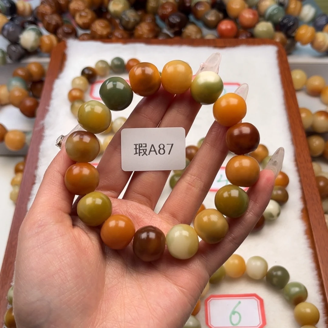 菩提根/象牙果手串梧*14mm瑕苹果珠一串a87