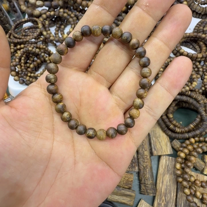 沉香沉香碎屑奇楠沉香乌身卡0.6单圈虫漏珠3克+