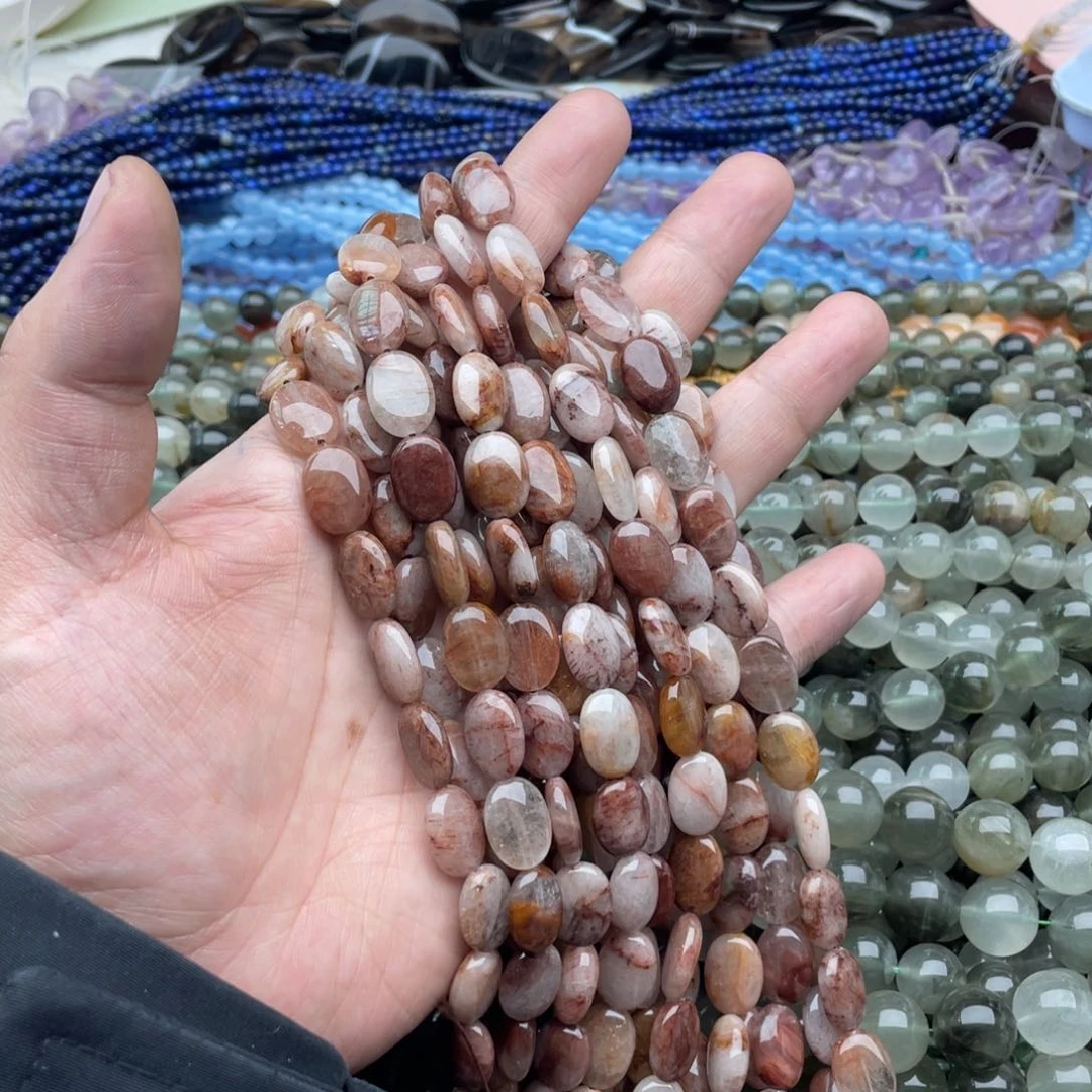 玛瑙/玉髓珠宝半成品未镶嵌一条装10*13左右铜发晶椭圆片