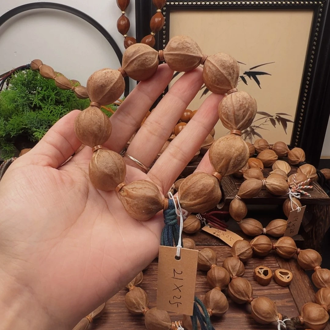 ✎***家手串橄榄核21.25梅林铁核