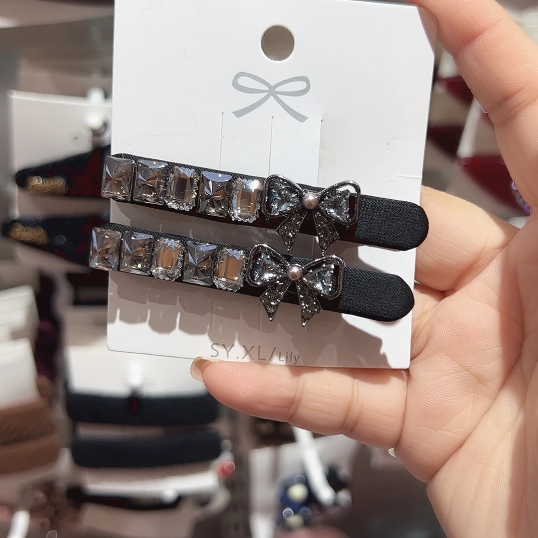 皮质非金属黑色蝴蝶结钻鸭夹一对