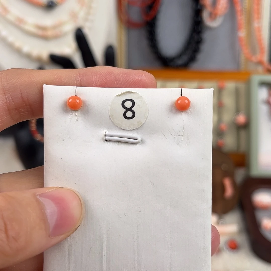 卡4.5橘色深水孩儿面耳钉