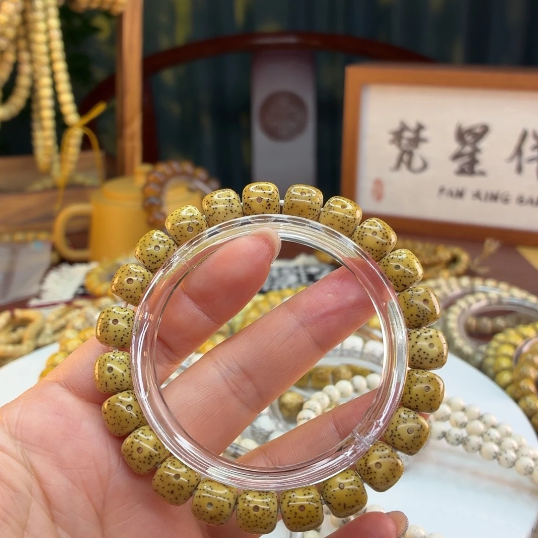 星月菩提手串海南星月菩提鸡油黄星点货