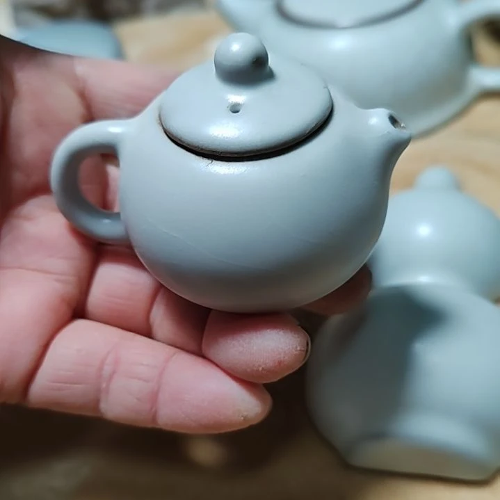 官瓷天青釉把把壶