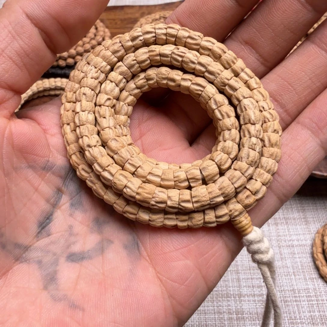 柏香籽/百香籽手串6.5mm鬼玲珑