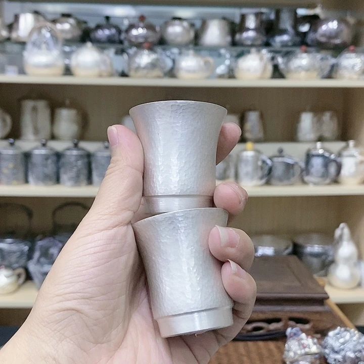 茶盏闲**影一两锤纹杯子