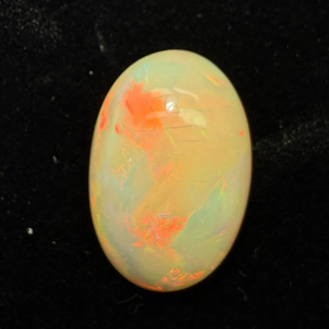 14.03ct天然彩欧泊裸石，尺寸23.1*15.5*8.6mm，颜色美艳，油画般色
