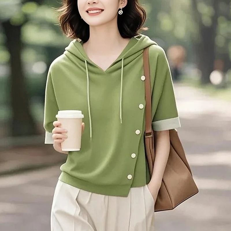 2025秋季新款女绿色连帽卫衣时尚减龄休闲显瘦慵懒风不规则上衣