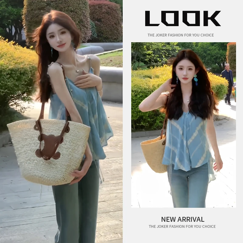 流行穿搭一整套女2025新款设计感海边度假风吊带小衫牛仔裤两件套