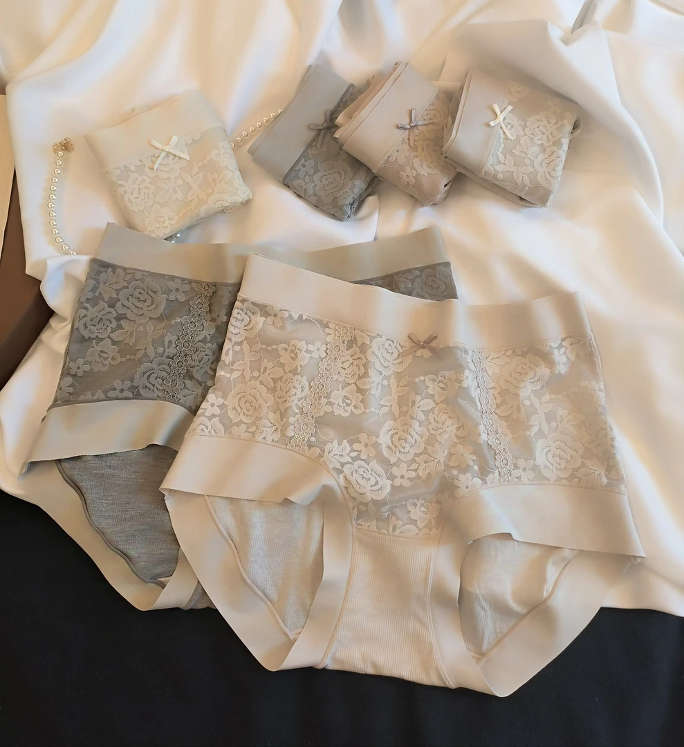 女性感蕾丝中腰无痕薄款桑蚕丝裆纯欲风三角内裤