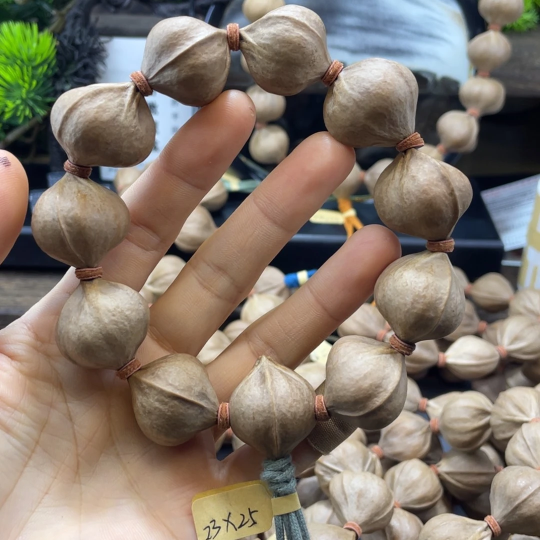 遨***游吊坠橄榄核2325铁核